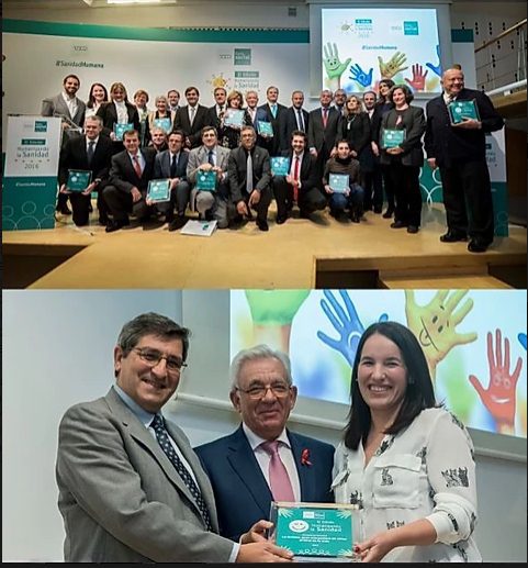 Equipo de la recibe reconocimientos en Madrid, con huellas de colores celebrando los cuidados paliativos pediátricos